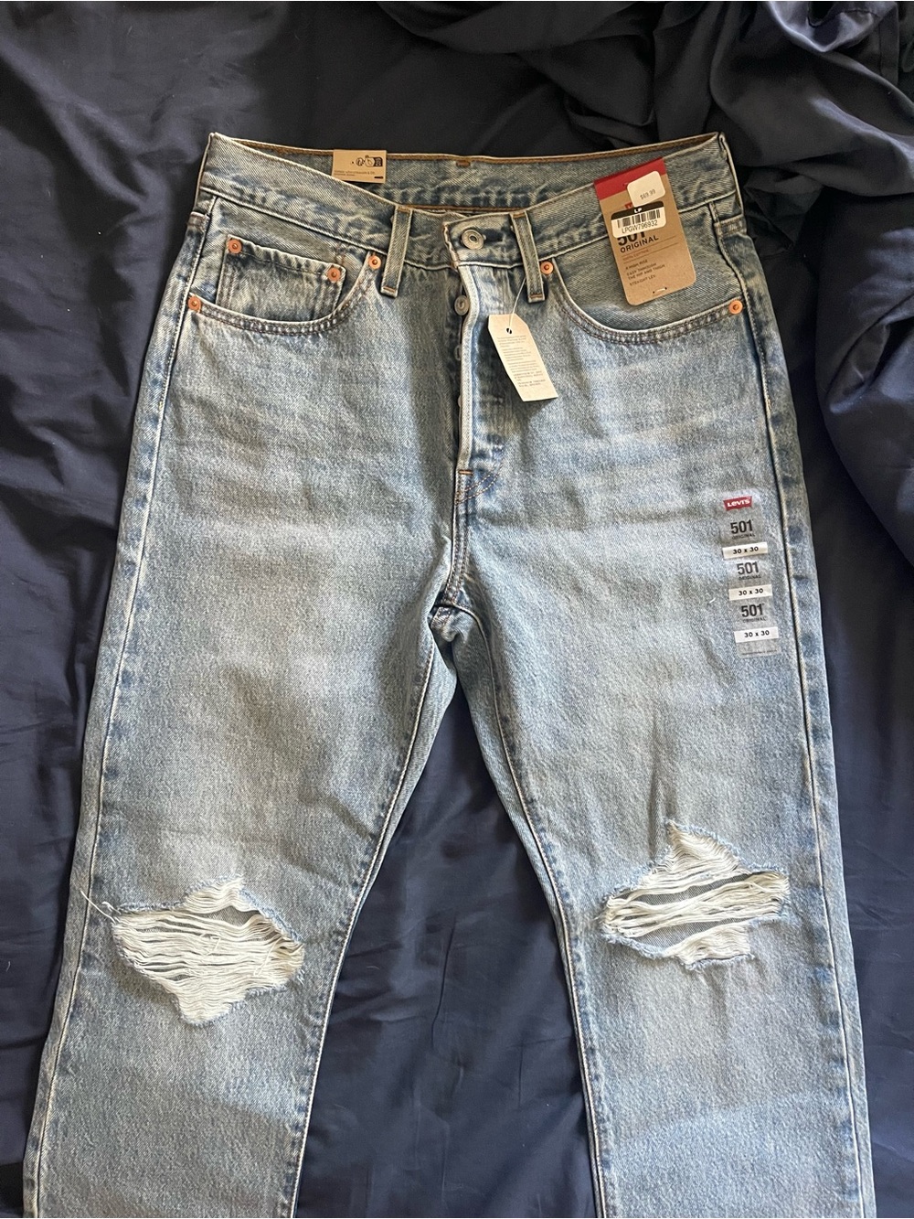 Levi's Light Blue Women's Straight Leg Jeans with Distressed Knees